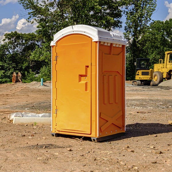 what is the cost difference between standard and deluxe portable restroom rentals in Portage County Ohio